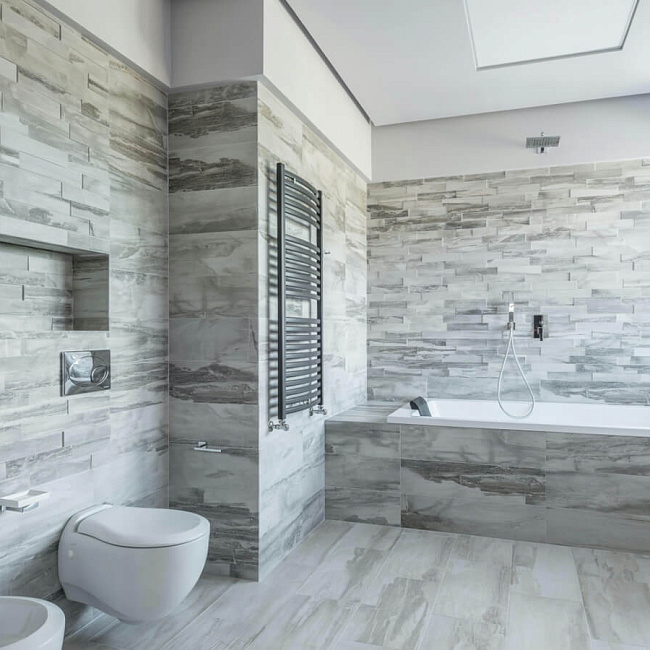 Дизайн ванной комнаты с плиткой: ключевые тренды и уютные решения